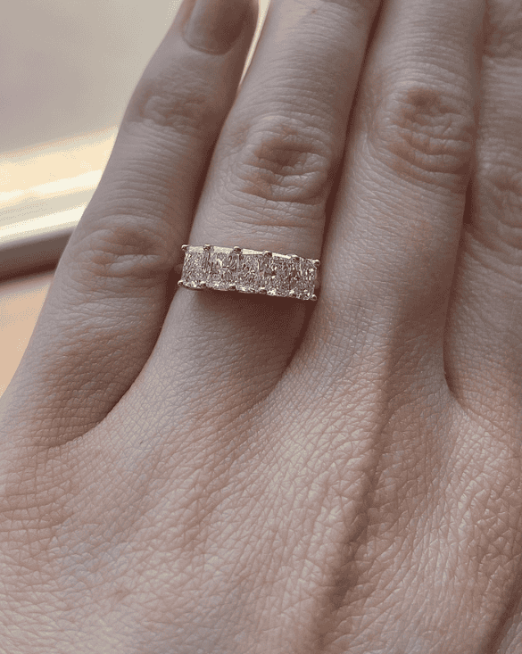 Winter Jewelry gold ring shines with clear stones, showing classic beauty and style for special moments in Williamsville.