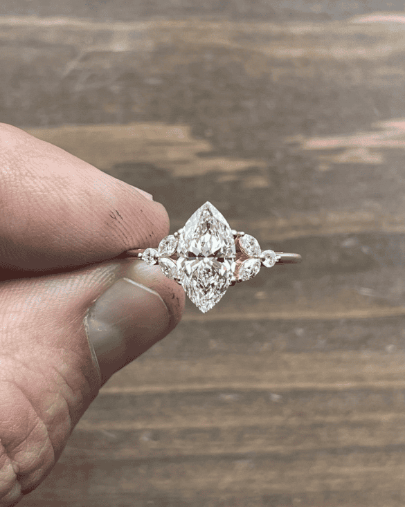 Winter Jewelry gold ring shines with beautiful diamonds, showing elegant style and fine craft for special moments.