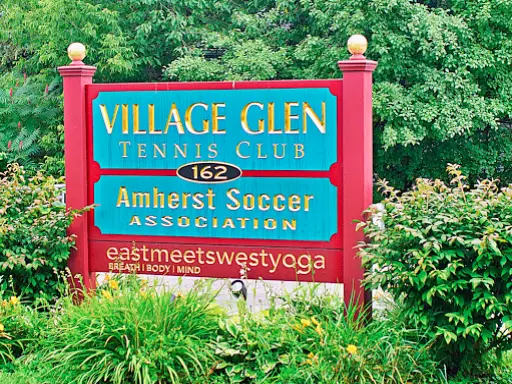 A sign for local clubs appears near Winter Jewelry, a popular Williamsville store just minutes away.
